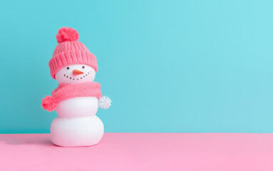 Christmas cute snowman. banner with space for text in pink delicate pastel colors on a plain background