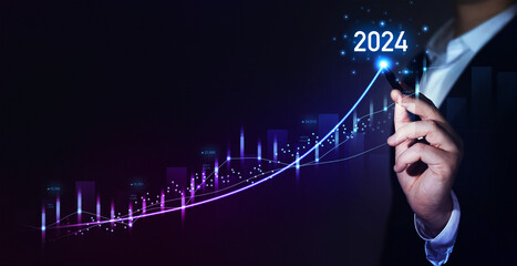 Businessman draw growth graph a year 2024 of business and data analysis. Development to success in year 2024. - obrazy, fototapety, plakaty