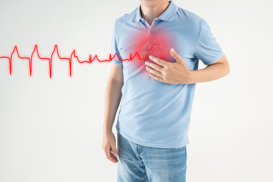Heart attack, man with chest pain suffers from heartache, myocardial infarction, cardiogram and heartbeat
