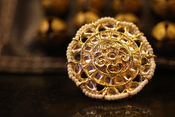 designer precious stone ring isolated on a plain background