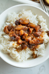 Braised meat over cooked rice, famous and delicious street food in Taiwanese restaurant.