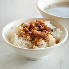 Braised meat over cooked rice, famous and delicious street food in Taiwanese restaurant.