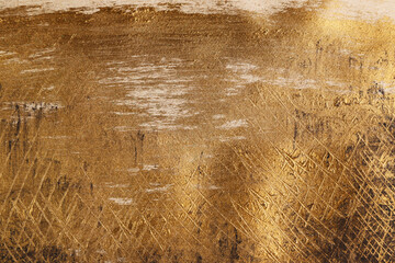 Fondo materico graffito di colore nero, marrone, oro; luce radente, spazio per testo