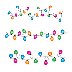 Set of different types of Christmas light bulbs garlands on transparent background. New Year, party  concept.