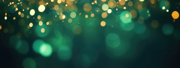 Foto op Canvas Abstract blur bokeh banner background. Gold bokeh on defocused emerald green background © vejaa