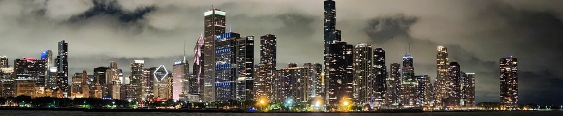 Panoramic view of the cityscape of Chicago, Illinois at cloudy night