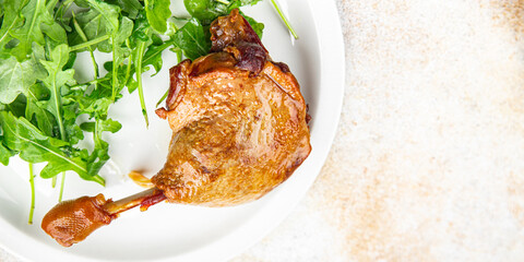 duck leg confit berry sauce poultry meat second course delicious eating cooking appetizer meal food snack on the table copy space food background rustic top view