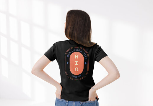 Mockup of woman wearing customizable t-shirt, hands on hips