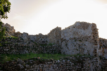 Ruins of Angelokastro Castle in the evening under a blue sky on the island of Corfu