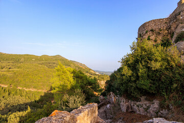 Ruins of Angelokastro Castle in the evening under a blue sky on the island of Corfu