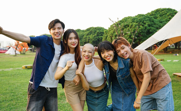 Image of a group of young Asian people laughing happily together