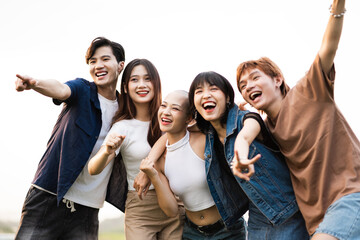 Image of a group of young Asian people laughing happily together