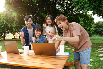 Image of a group of Asian students studying together