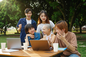Image of a group of Asian students studying together