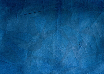 Black dark blue texture background for design. Toned rough concrete surface. A painted old paper.