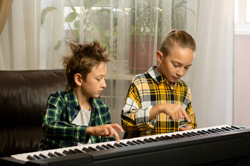 Brothers Sharing Piano Moments - Powered by Adobe