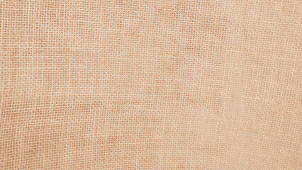 Fototapeta na wymiar brown fabric texture. close up of beige colored fabric texture. Hessian sackcloth, jute flax woven texture pattern background in light cream beige brown color