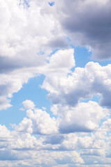 Naklejka na ściany i meble Beautiful blue sky with many white fluffy light cloud in sunlight background, texture