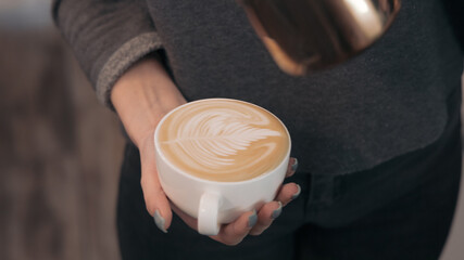 Barista coffee service concept.Barista women using coffee machine to make coffee in cafe