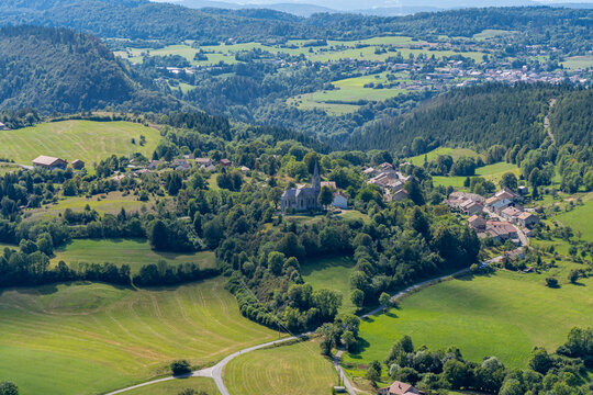 Cuchet belvedere, France - 09 02 2021: View of the landscapes of Les Bouchoux with the village, hills, forests and The promontory .