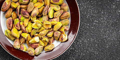 pistachios peeled without shell nut healthy eating cooking appetizer meal food snack on the table copy space food background rustic top view keto or paleo diet vegetarian vegan food