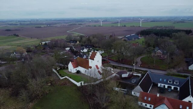 Aerial of a Bromme Parish church in Soro, Denmark on a cloudy day