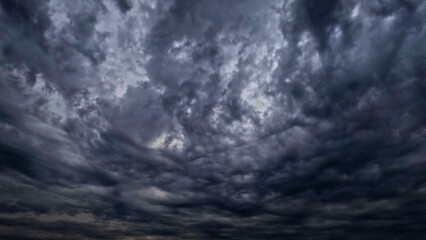 Fototapeta na wymiar nice cloudscape of sky with heavy rain or snow clouds bg - photo of nature