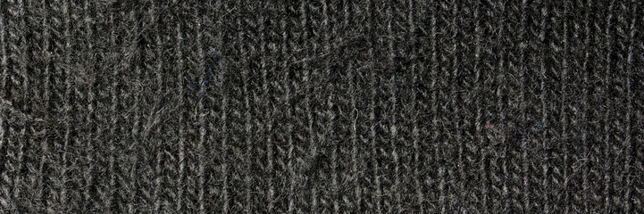 The texture of black woolen fabric