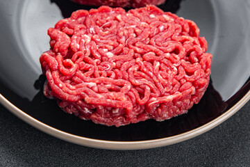 ground meat raw cutlet fresh beef meat hamburger eating cooking appetizer meal food snack on the table copy space food background rustic top view