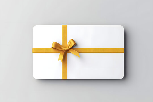 Blank Minimal White Gift Card Or Gift Voucher With Golden Ribbon Rope Bow Isolated On Grey Background With Shadow Minimal Creative Idea Concept 3D Rendering