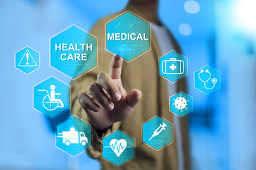 Hand pointing on medical and health care icons represent to quick access treatment public health services or people can be accessed through communication to healthy community hospital and clinic