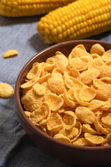 Corn flakes in a plate on the table. Healthy breakfast