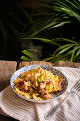 Farfalle with turkey, broccoli, hot peppers and zucchini.