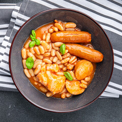 cassoulet dish  thick bean soup meat, bean, sausage delicious eating cooking appetizer meal food snack on the table copy space