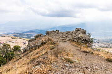 Mysterious mountain landscape of the Valley of Ghosts on the western slope of Mount Demerdzhi in Crimea. Popular tourism and trekking destination