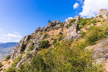 Mysterious mountain landscape of the Valley of Ghosts, a cluster of strangely shaped rocks on the western slope of Mount Demerdzhi in Crimea