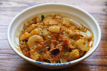 close up crab roe meat noodles. Chinese seafood noodle dish