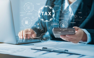Business operators use computers to fill out personal income tax refund forms online to pay taxes....
