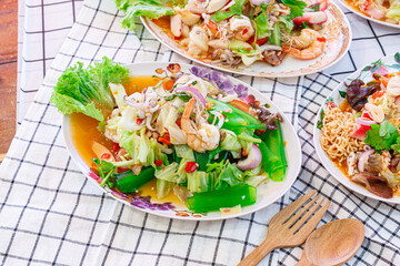 Spicy Shanghai noodles on a plate. Thai cuisine Yum traditional spicy