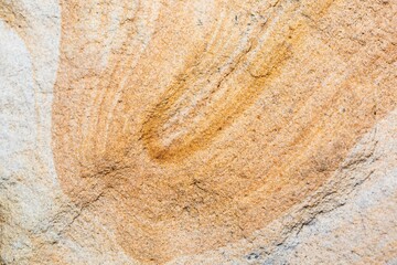 Closeup of a rock formation with red stains