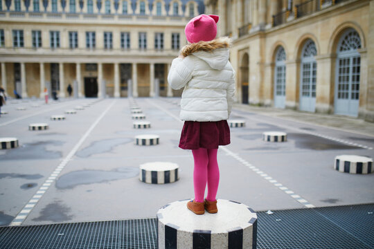 Child having fun in Paris, France. Happy kid playing outdoors