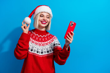 Photo of sweet attractive lady santa helper dressed ornament sweater chatting twitter telegram...