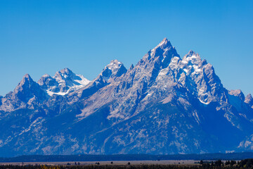 Cathedral Group mountains in Grand Teton National Park during fall