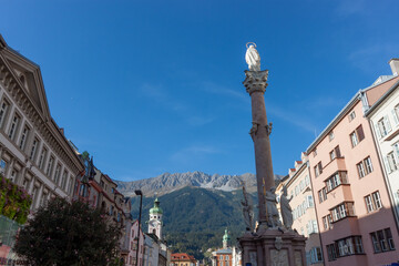 Fototapeta na wymiar Cityscape of Innsbruck with the St. Anne's Column and Nordkette