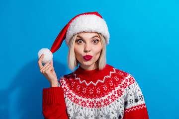 Photo of flirty pretty woman lady santa elf wear ornament pullover sending kiss isolated blue color background