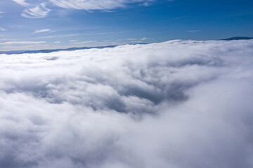 Flying above the clouds the with a drone
