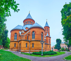 Fototapeta na wymiar The small park around Holy Apostles Peter and Paul Church, Chernivtsi, Ukraine