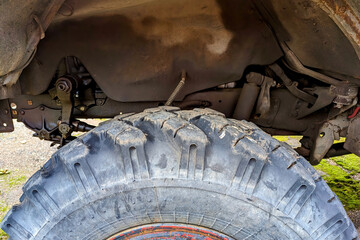 Front axle of an off-road truck. Selective focus.