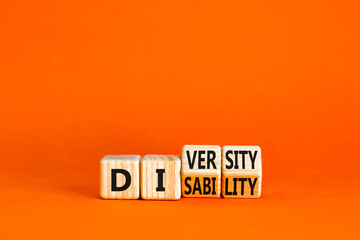 DEI Diversity or disability symbol. Concept words Diversity disability on wooden block. Beautiful orange table orange background. Business diversity disability concept. Copy space.