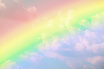 Fototapeta na wymiar Beautiful rainbow with clouds and blue sky